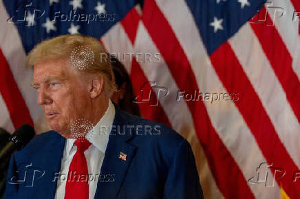 FILE PHOTO: Republican presidential nominee and former U.S. President Donald Trump looks on during a press conference at Trump Tower in New York City