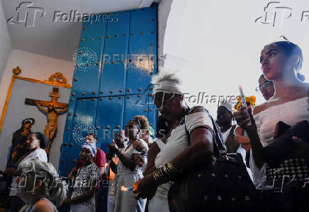 Cuban faithful carry out the traditional procession of the Virgin of Regla