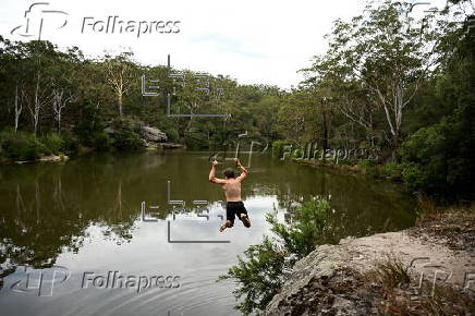 People cool off at Lake Parramatta, near Sydney