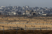 Buildings lie in ruin in the Gaza Strip, amid the ongoing conflict between Israel and Hamas, as seen from southern Israel