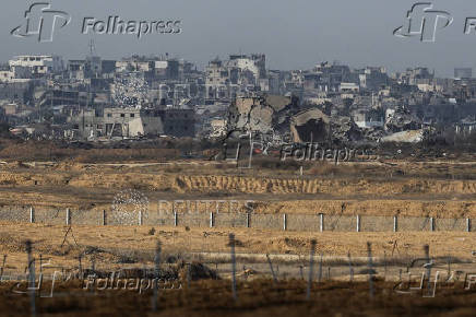 Buildings lie in ruin in the Gaza Strip, amid the ongoing conflict between Israel and Hamas, as seen from southern Israel