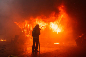 Palisades Fire burns during a windstorm on the west side of Los Angeles