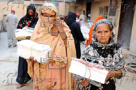 Edhi Welfare Organization donates clothes prior to Eid al-Fitr celebrations in Hyderabad