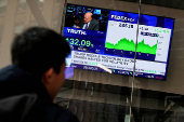 FILE PHOTO: Shares of Truth Social and Trump Media & Technology Group displayed outside Nasdaq Market site in New York