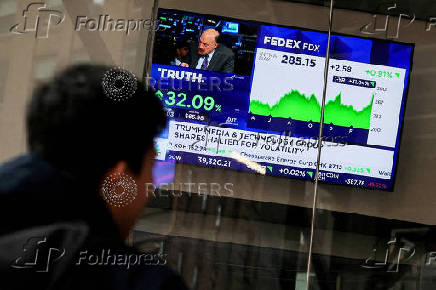 FILE PHOTO: Shares of Truth Social and Trump Media & Technology Group displayed outside Nasdaq Market site in New York