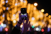 Paris Olympics chief Estanguet turns on Christmas lights on the Champs Elysees