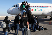 Displaced Lebanese, who had fled to Iraq, prepare to head back home after a ceasefire between Israel and the Lebanese armed group Hezbollah took effect, in Najaf