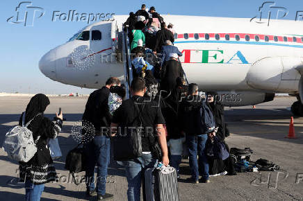 Displaced Lebanese, who had fled to Iraq, prepare to head back home after a ceasefire between Israel and the Lebanese armed group Hezbollah took effect, in Najaf