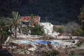 A view of a destroyed building in southern Lebanon as seen from Israel's side of the border with Lebanon