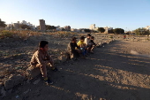 Young Yemenis play soccer in Sana'a