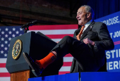 U.S. Senate Majority LeaderChuckSchumer(D-NY) shows off his Syracuse University orange socks, in Syracuse