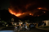 Firefighters battle 'Airport Fire' wildfire in California