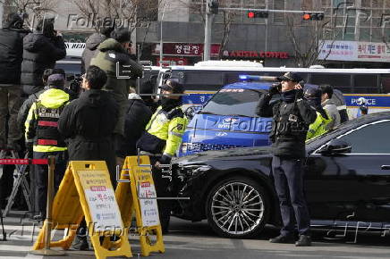 South Korea's impeached President Yoon Suk Yeol arrives for court