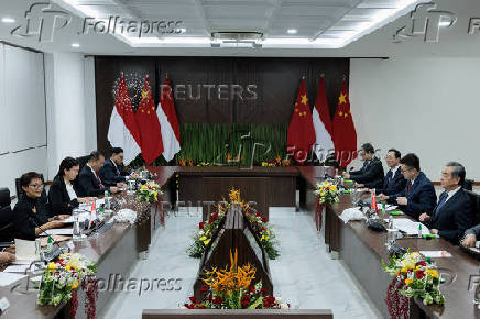 Chinese Foreign Minister Wang Yi and Indonesian Foreign Minister Retno Marsudi attend a bilateral meeting in Jakarta