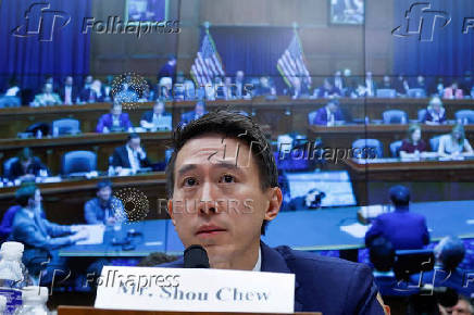 FILE PHOTO: TikTok Chief Executive Shou Zi Chew testifies before a House Energy and Commerce Committee, in Washington