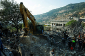 Aftermath of an Israeli strike, in the town of Almat