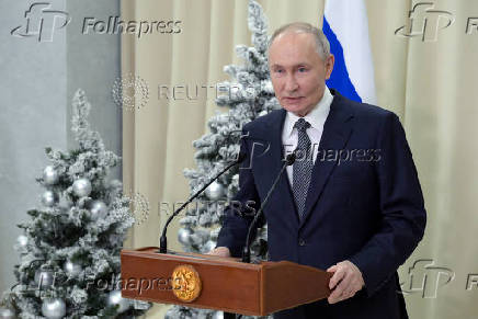 Russian President Putin attends a press conference in Leningrad region