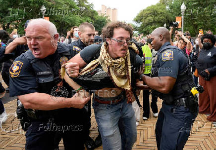 University of Texas Police detain a man at a pro-Palestinian protest at the University of Texas