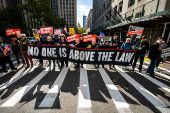 People protest near the Manhattan Criminal Court in New York City