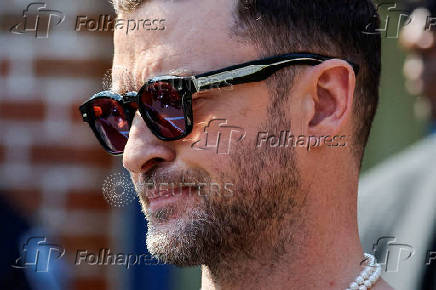 Singer Justin Timberlake waits to address the media after his appearance in court in Sag Harbor, New York