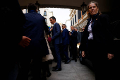 Spanish PM Sanchez talks to the media after attending a vote on a fiscal package extending a windfall tax on banks at Parliament in Madrid