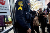 Protest in front of the residence of the University of Michigan's president, in Ann Arbor