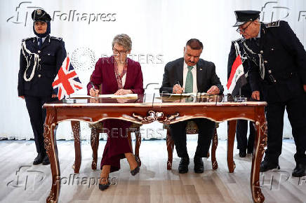 Britain's Home Secretary Yvette Cooper meets Iraq's Minister of Interior Abdul Amir Al-Shammari, in Baghdad