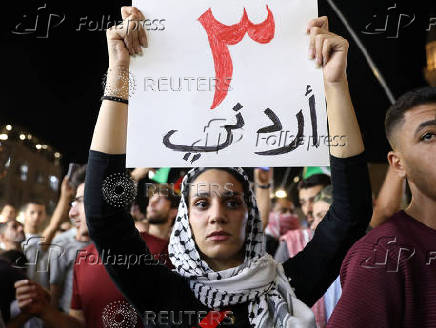 March in support of Palestinians in Gaza and to salute the slain Jordanian who shot and killed three Israeli civilians, in Amman