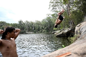 People cool off at Lake Parramatta, near Sydney