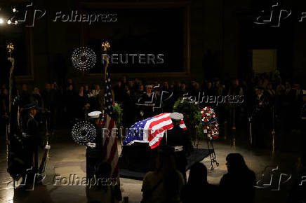 The casket of Jimmy Carter lies in state in Washington