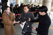 Seok Dong-hyeon, a lawyer for South Korea's impeached President Yoon Suk Yeol, arrives at a court, in Seoul