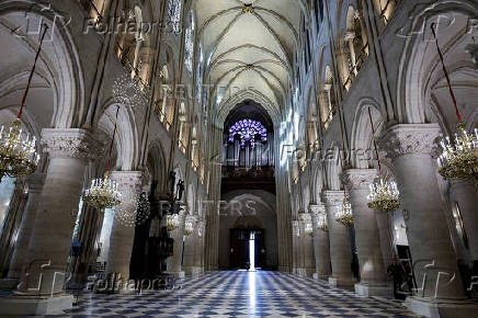 French President Macron visits the Notre Dame Cathedral, in Paris