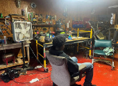 Abdur Rahim Jabbar, half-brother of the Texas truck attack accused, sits in the garage of their house in Beaumont