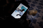 The Wider Image: African migrant disaster survivor haunted by weeks lost at sea