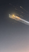 Orange balls of light fly across the sky as debris from a SpaceX rocket launched in Texas is spotted over Turks and Caicos Islands