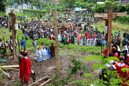 Indonesian Catholics perform a re-enactment of the crucifixion of Jesus Christ during Good Friday in Manokwari