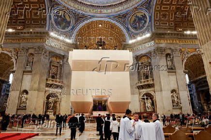 Canopy over St. Peter's Basilica high altar is covered during restoration, at the Vatican