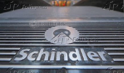 FILE PHOTO: A moving stairway of Swiss elevator maker Schindler is pictured at a mall in Neuss