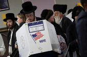 FILE PHOTO: The Wider Image - Behind the curtains: scenes from the US election