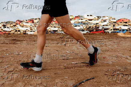 Flood-affected residents share opposite views on the Valencia marathon