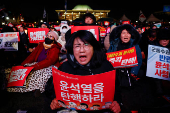 Protesters take part in a rally calling for the impeachment of South Korean President Yeol, in Seoul