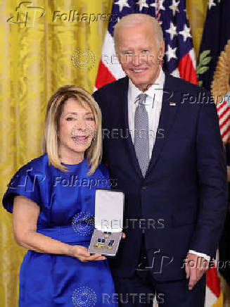 U.S President Biden gives the Presidential Citizens Medal, one of the country's highest civilian honors, during a ceremony at the White House in Washington