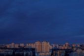 A view of the city at sunrise during an air raid alert in Kyiv