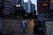 A man climbs up the steps in Sao Paulo