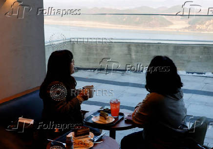 Starbucks opens new store inSouthKorea's border town, offering views of NorthKorean village