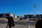 Investigators search a townhouse, in relation to the explosion in Las Vegas of a Tesla Cybertruck