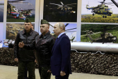 Russian President Vladimir Putin meets with military pilots in Torzhok