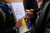 FILE PHOTO: Protesters gather outside the Toronto International Film Festival (TIFF) screening of 'Russians at War', in Toronto