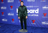 El negro y los diseos clsicos intervenidos dominaron la alfombra de los Latin Billboards