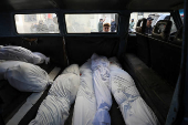 Gazans mourn loved ones killed in an Israeli strike